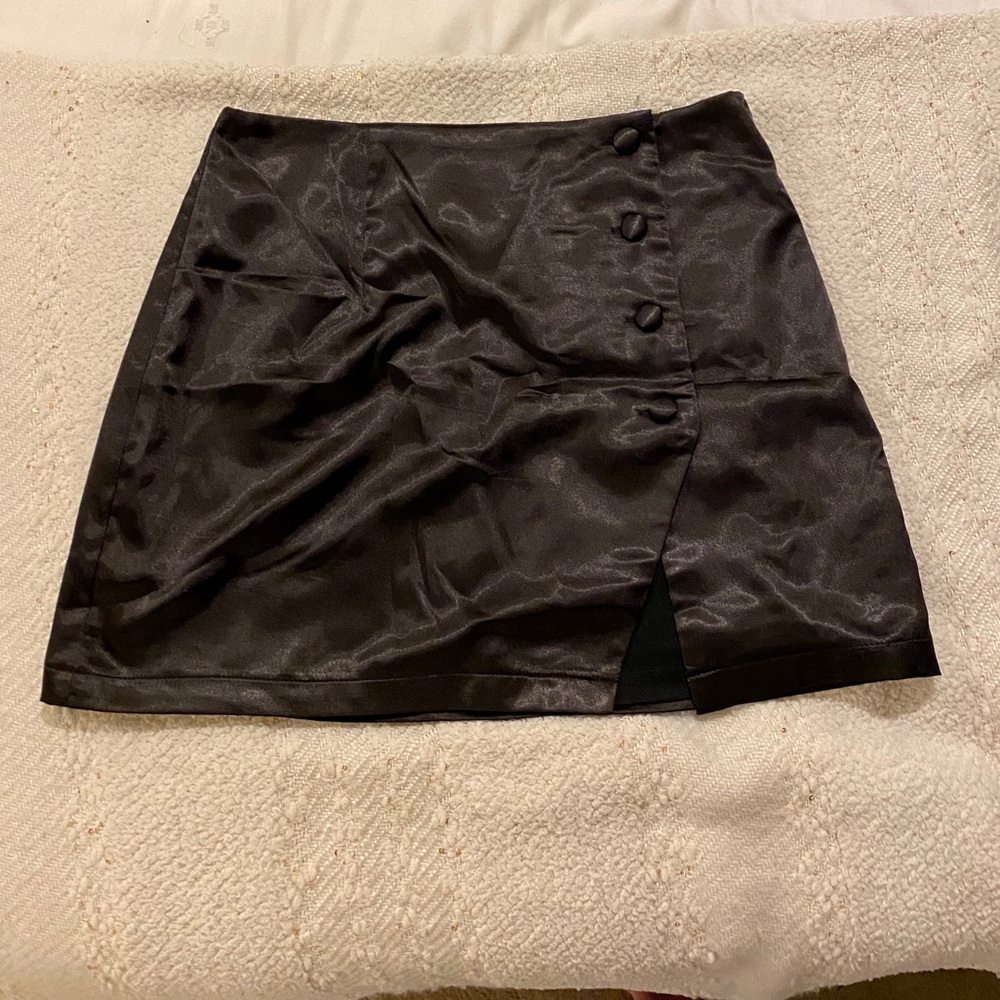 Black satin mini skirt